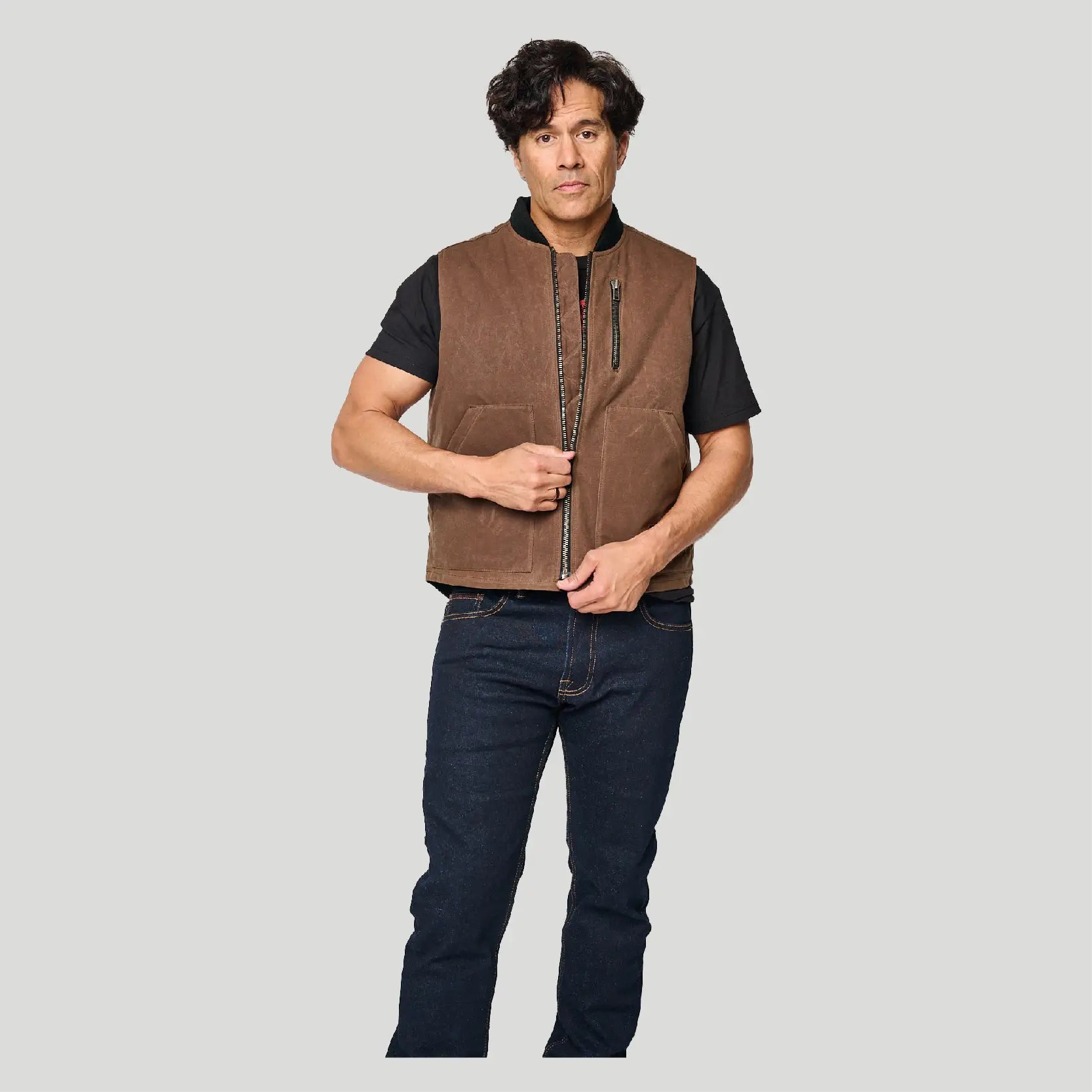 The Wasteland Protective Vest - Brown. Large Back Pocket for a D3O Back Armor Protector. 15oz Waxed Cotton Canvas. Water Resistant. Tobacco Motorwear The Wasteland Protective Vest - Brown. Large Back Pocket for a D3O Back Armor Protector. 15oz Waxed Cotton Canvas. Water Resistant. Tobacco Motorwear